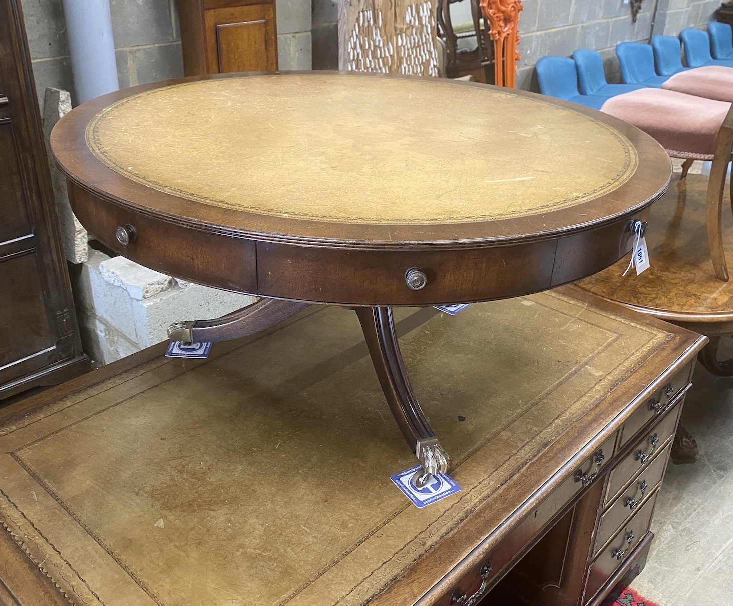 A reproduction mahogany circular drum coffee table, diameter 110cm, height 54cm